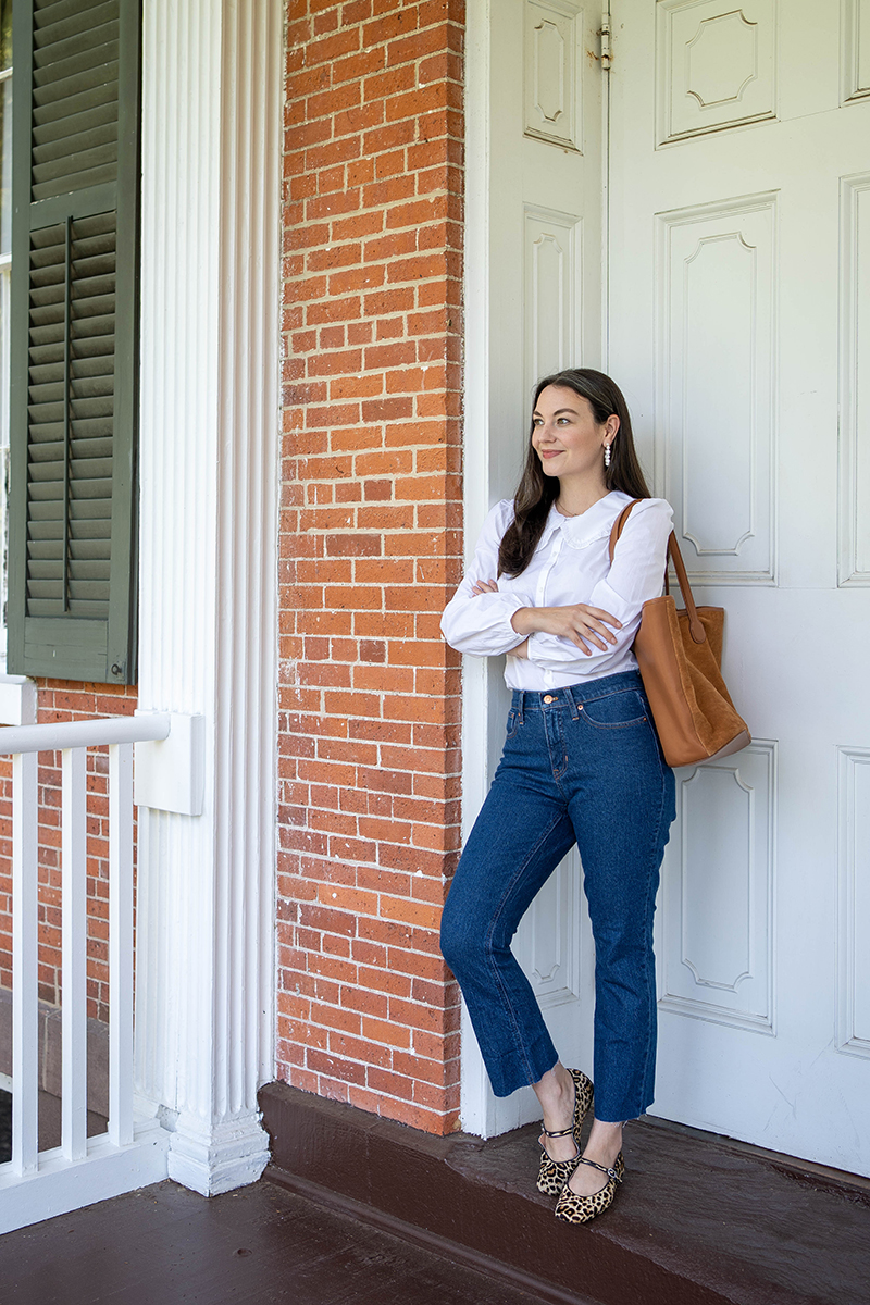 A classic fall outfit featuring demi-boot crop jeans and a ruffle collared shirt