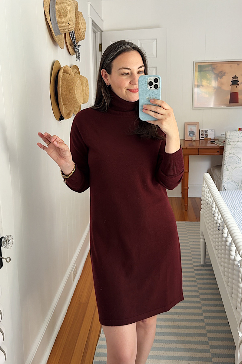 Carly Riordan wearing a Quince burgundy cashmere sweater dress.